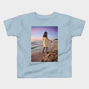 Little girl standing on beach Kids T-Shirt